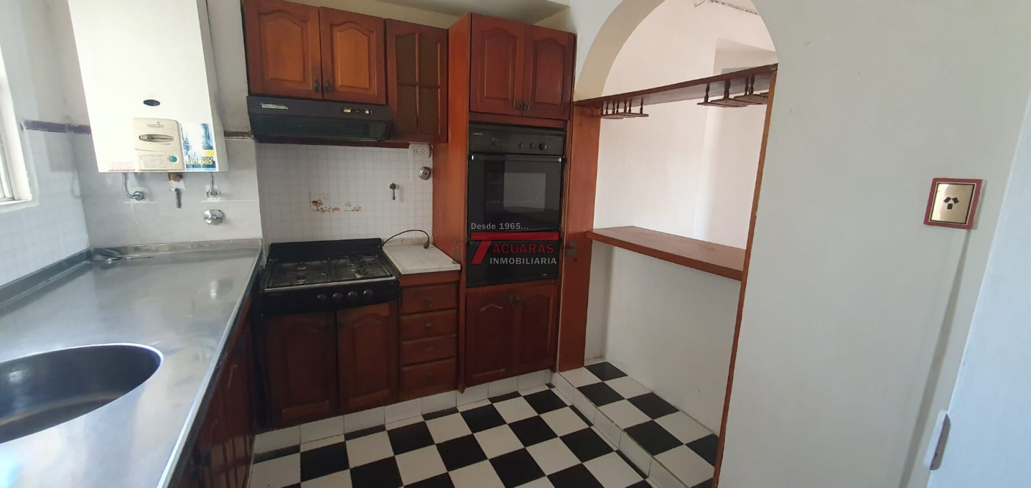 VENTA DE DEPARTAMENTO DOS DORMITORIOS Y COCHERA ZONA PARQUE URQUIZA .