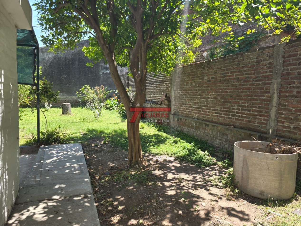 CASA 2 DORMITORIOS Y FONDO EN CALLE FRAGATA SARMIENTO.